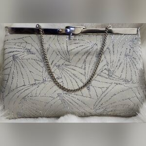Sophisticated Silver Clutch with Embroidered Design